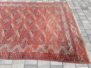 An old or antique Yomud Turkmen carpet with 354/200 cm. Good shape for its age with smallest repiles. Original endings on the long sides and kilim on one side.    