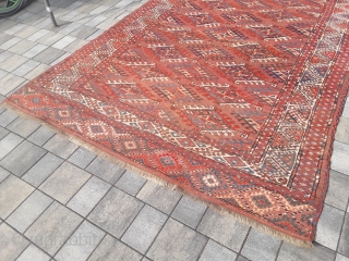 An old or antique Yomud Turkmen carpet with 354/200 cm. Good shape for its age with smallest repiles. Original endings on the long sides and kilim on one side.    