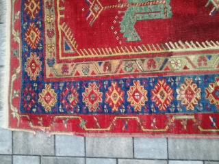 An antique Anatolian rug with 170/110 cm. Repiles and demages. Rare design.                     