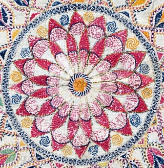 Kantha quilted embroidery
Early Twentieth century

This baytan kantha has a large central mandala with a traditional pelated form surrounded by boteh, or paisley motifs, and four tree of life forms. between them are  ...