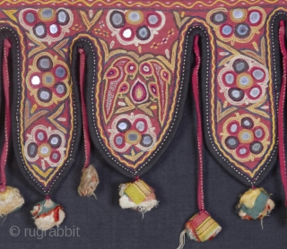 TORAN •
'Embroidered door hanging'

One of the best and rare example of Sodha Rajput embroidery. It has all the elements of Sodha Rajput embroidery technique which includes pakko, kharek, abhla, bhavariyo, satin and  ...