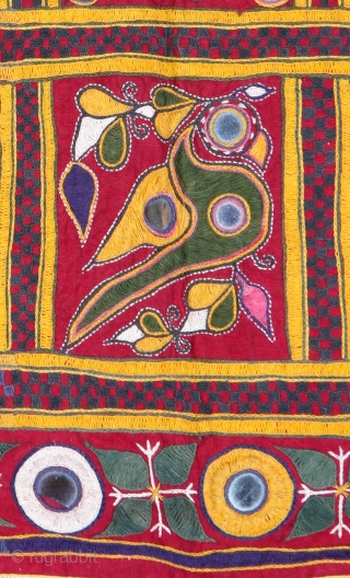 • WALL HANGING •

Kangara, Gujarat mid 19th century

This wall hanging embroidered with typically pahari floral design; the use of small pieces of mirror was introduced by the Gujarat settlers in this region.

The  ...