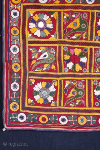 • WALL HANGING •

Kangara, Gujarat mid 19th century

This wall hanging embroidered with typically pahari floral design; the use of small pieces of mirror was introduced by the Gujarat settlers in this region.

The  ...