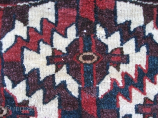 Yomud mini-asmalyk. 2'1" x 1'. Great natural colors, wool, and condition, with wonderful green. 
Late 19th century.                