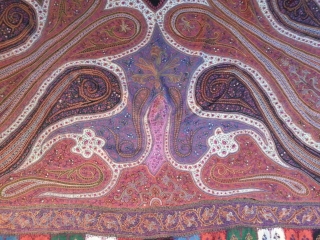 Unique indian embroidered shawl in great condition rare colors and very fine work, size ia about 190 by 190 cms             