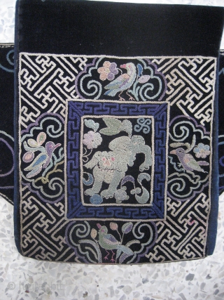 Mongolian official horseriders waist pouch.Silk and cotton embroidery on cotton, and cotton velvet, with indigo cotton linings.Est. late 19th century.             