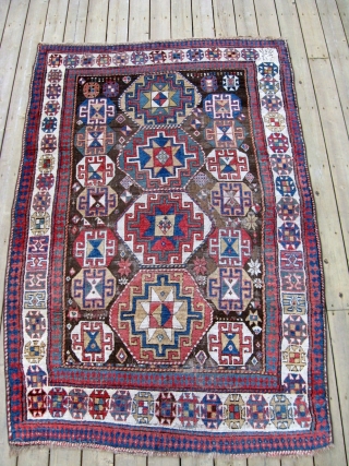 Armenian Kazak 5'3" x 7'10" A great old Kazak presumably of Armenian origin with a date of 188(?) Nicely stacked octagons. Areas of wear.         