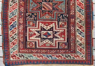 Late 19th c. Gendje, 3'8" x 9'1".  A very attractive long rug featuring lovely stars and animals in very good condition.           