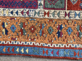 E. Anatolian rug, 6'4" x 4'6", late 19th C. richly colored with a beautiful red abrash, aubergine, sea green, and peach border.  Unlike many others of this type, the composition and  ...