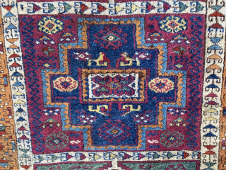 E. Anatolian rug, 6'4" x 4'6", late 19th C. richly colored with a beautiful red abrash, aubergine, sea green, and peach border.  Unlike many others of this type, the composition and  ...