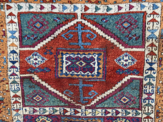 E. Anatolian rug, 6'4" x 4'6", late 19th C. richly colored with a beautiful red abrash, aubergine, sea green, and peach border.  Unlike many others of this type, the composition and  ...