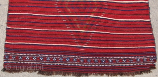 One of 6 dramatic and colorful sleeping rugs purchased from Baluchi tribesmen living in the area between Quetta and Kandahar. The rug measures 47" x 69".  The wool is long and  ...