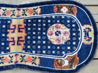 Antique Chinese saddle cover, 4' x 2', excellent condition with soft shiny wool, and well balanced design.  Blue is not as intense, over-saturated, as it appears in the picture.   