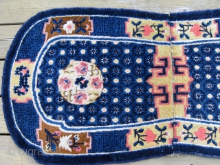 Antique Chinese saddle cover, 4' x 2', excellent condition with soft shiny wool, and well balanced design.  Blue is not as intense, over-saturated, as it appears in the picture.   