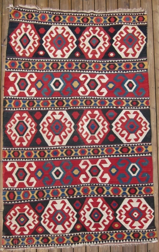 Zangadzor Region Kilim, S. Caucasus,  5'9" x 8'11".  A strikingly beautiful kilim with intense rich colors. There is a sleeve on the back for hanging. Minor restoration along the edges.  ...