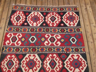 Zangadzor Region Kilim, S. Caucasus,  5'9" x 8'11".  A strikingly beautiful kilim with intense rich colors. There is a sleeve on the back for hanging. Minor restoration along the edges.  ...