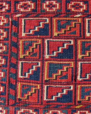 Beshir torba, 1'3" x 4'  An appealing torba with a tile design enhanced by the diagonal rows of blue and red. In full pile with all natural dyes.    