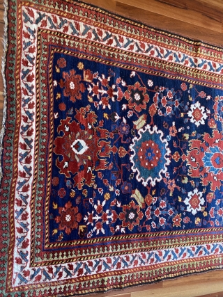 Kurdish Sauj Bulaq carpet featuring a beautiful Harshang design, 2nd half 19th C., 12' x 5'2", in excellent condition. Minor losses to ends. Full pile with small areas of light wear.   ...