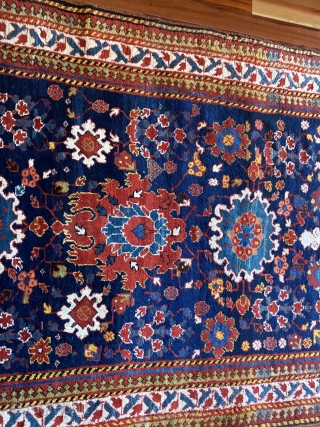 Kurdish Sauj Bulaq carpet featuring a beautiful Harshang design, 2nd half 19th C., 12' x 5'2", in excellent condition. Minor losses to ends. Full pile with small areas of light wear.   ...