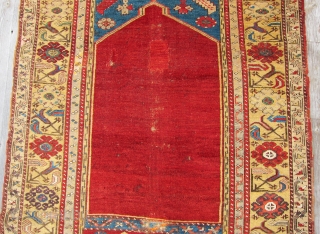 Ladik Prayer Rug, 1st Qtr. 19th C.3'5" x 5'4"An early Ladik prayer rug., circa 1800, with an unusual treatment of the mihrab. The customary stepped sides of the arch have been simplified  ...