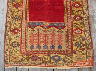 Ladik Prayer Rug, 1st Qtr. 19th C.3'5" x 5'4"An early Ladik prayer rug., circa 1800, with an unusual treatment of the mihrab. The customary stepped sides of the arch have been simplified  ...