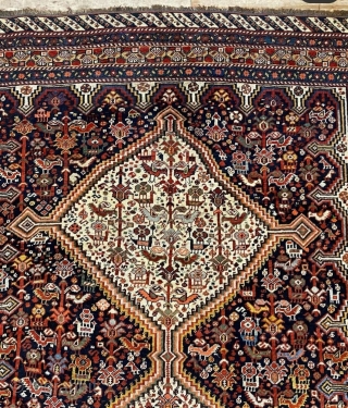 This exquisite rug showcases the artistry of Persian tribal craftsmanship with a distinctive Ghashghai Khamseh Bird design. Woven by skilled artisans, this collectible piece is crafted from high-quality wool and features intricate  ...