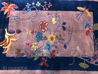 Nice purple ground Art Deco Chinese rug. Overall is in good condition with a couple of area where show minor wear.            