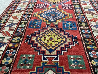 Antique Kazak rug in good overall condition.
Size 280x125 cm                        