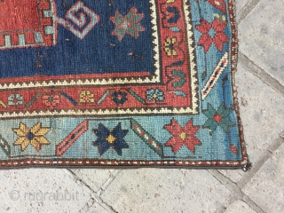 Kazak,knotted rug with symmetrical design,indigo blue on field,in good condition ,wool foundation                     