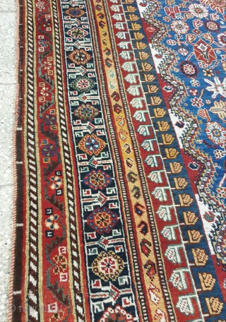 Mersmerisizng burst of flowers on this blue field qashqai rug makes this rug an collectible item , almost in excellent condition. Borders has very unique design, it is possibly woven by IGDIR  ...