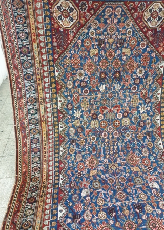 Mersmerisizng burst of flowers on this blue field qashqai rug makes this rug an collectible item , almost in excellent condition. Borders has very unique design, it is possibly woven by IGDIR  ...