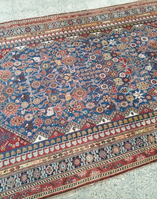 Mersmerisizng burst of flowers on this blue field qashqai rug makes this rug an collectible item , almost in excellent condition. Borders has very unique design, it is possibly woven by IGDIR  ...
