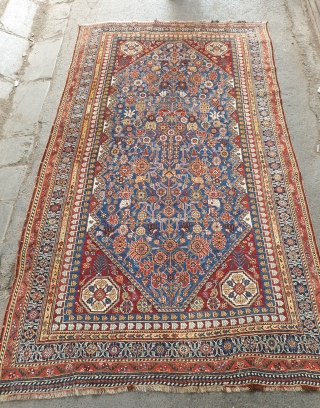 Mersmerisizng burst of flowers on this blue field qashqai rug makes this rug an collectible item , almost in excellent condition. Borders has very unique design, it is possibly woven by IGDIR  ...