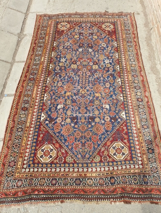 Mersmerisizng burst of flowers on this blue field qashqai rug makes this rug an collectible item , almost in excellent condition. Borders has very unique design, it is possibly woven by IGDIR  ...