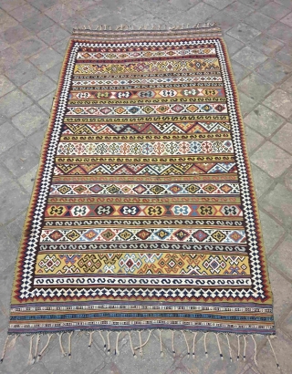 Qashqai kilim

Exemplary Qashqai kilim with lively sharp colors. golden yellows , light blues & grass greens gives a genuine soul into the kilim.Whites are made of cotton.
 the design is composed of  ...