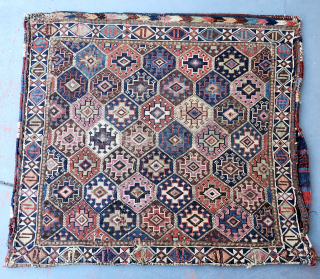 Shahsavan reverse soumak, 19C. Measures roughly 62cmx60cm.  Natural colours with cochineal. Good condition ...some surface wear and minor side splitting... see pics. Quite a floppy handle for this type.

Ships from Australia.

richardfromdurban@gmail.com  ...