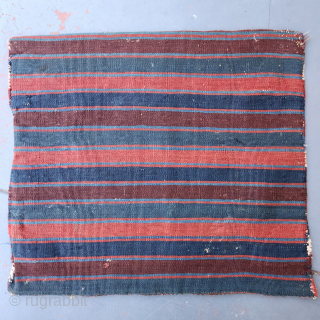 Shahsavan reverse soumak, 19C. Measures roughly 62cmx60cm.  Natural colours with cochineal. Good condition ...some surface wear and minor side splitting... see pics. Quite a floppy handle for this type.

Ships from Australia.

richardfromdurban@gmail.com  ...