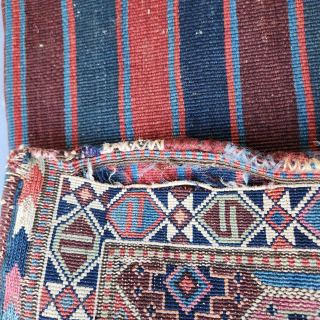 Shahsavan reverse soumak, 19C. Measures roughly 62cmx60cm.  Natural colours with cochineal. Good condition ...some surface wear and minor side splitting... see pics. Quite a floppy handle for this type.

Ships from Australia.

richardfromdurban@gmail.com  ...