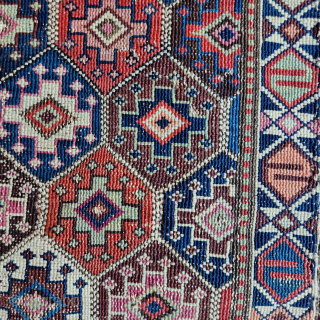 Shahsavan reverse soumak, 19C. Measures roughly 62cmx60cm.  Natural colours with cochineal. Good condition ...some surface wear and minor side splitting... see pics. Quite a floppy handle for this type.

Ships from Australia.

richardfromdurban@gmail.com  ...