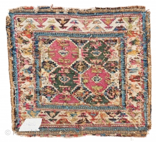 Rare and classic Shahsavan sumakh khorjin bagface, 19C, approx 57cm x 51cm.

Very fine weave with a softer palette and in good condition. All natural dyes with cochineal. 

Compare with plate 22 in  ...