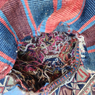 Shahsavan reverse soumak, 19c. Measures roughly 62cmx60cm. Excellent range of natural colours including cochineal. Comes with original back. Good condition ...some surface wear and minor side splitting... see pics. Great old piece.  ...