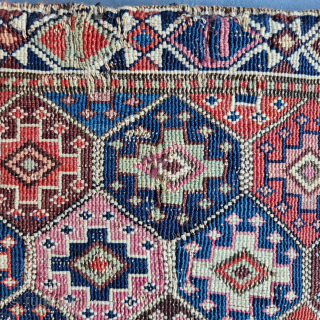 Shahsavan reverse soumak, 19c. Measures roughly 62cmx60cm. Excellent range of natural colours including cochineal. Comes with original back. Good condition ...some surface wear and minor side splitting... see pics. Great old piece.  ...