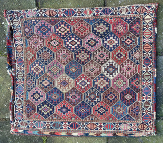Shahsavan reverse soumak, 19c. Measures roughly 62cmx60cm. Excellent range of natural colours including cochineal. Comes with original back. Good condition ...some surface wear and minor side splitting... see pics. Great old piece.  ...