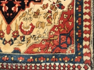 Ref 1623 Kashan pushti circa 1900 most probably Mohtashem. 90 x 44 - 3'0 x 1'6.  Good condition with purple silk overcasting.          