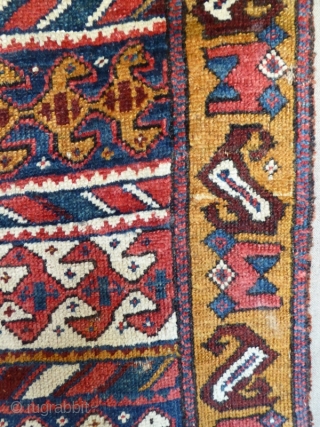 1534 North West Persian carpet, mid nineteenth century, 6'0 x 2'11, 183 x 89
wide range of brilliant natural colours.  Mounted on fabric, some small holes but generally good pile   