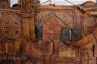 Antique tribal Malinese Touareq conical shaped leather bag. 46/33 x 30 cm (1ft 6"/1ft 1" x 1ft). Condition: good, original sides and back complete and intact, original leather tassels complete and intact,  ...