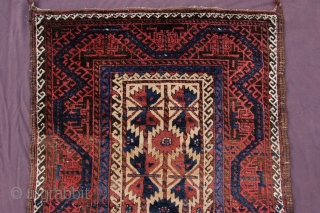 Meaty camelground tribal Baluch rug 134 x 93 cm  (4ft 10" x 3ft 1") last quarter 19th century. All natural dyestuffs, colours: red, dark blue, blueish green, camel, brown, dark brown  ...