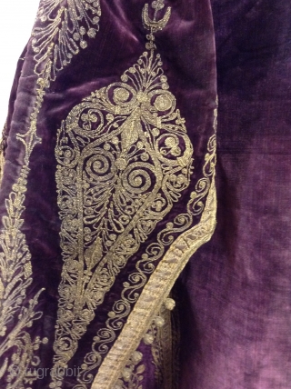 Full length Turkish woman's robe with open sleeves. Beautiful deep purple silk velvet with gold metal thread using couching style decoration.  I am guessing that it was made before the First  ...