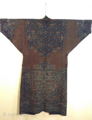 This robe was made by the indigenous people living on the northern most island of Japan. Both men and women wore these robes which are a form of appliche. the blue cotton  ...