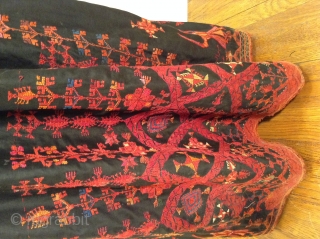 This is a beautiful Palestinian embroidered dress. it has a signature at the bottom and it is in perfect condition. i tried to highlight a photo of the embroidered signature plus a  ...